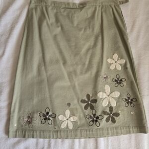 Olive green skirt with embroidered flowers